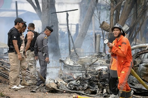 Thai police investigate bombing site (Photo: AFP/VNA)