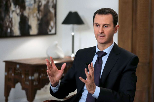 Số phận của Tổng thống Syria Bashar al-Assad là một trong những vấn đề then chốt mà phe đối lập tham gia đàm phán quan tâm. 					Ảnh: AFP