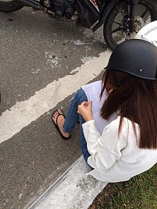 A girl, 20, is seen writing ‘I promise not to travel in the wrong direction on a one-way street again’ 50 times as a penalty slapped by local police for traffic violations in Ngu Hanh Son District, Da Nang, a coastal city in central Vietnam, on April 1, 2016. Toi Yeu Da Nang Facebook page