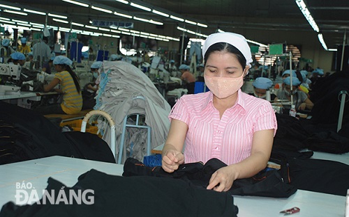 Employees at a local textiles and garment company