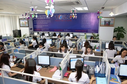 The operators of the new hotline (Photo: VNA)