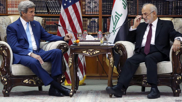 Ngoại trưởng Mỹ John Kerry (trái) gặp gỡ người đồng cấp Iraq Ibrahim al-Jaafari ở Baghdad. Ảnh: Reuters