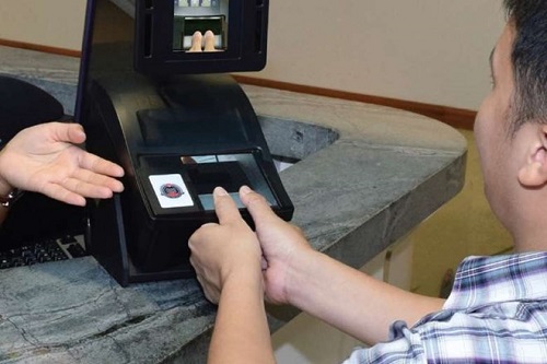 Travellers to Singapore will need to scan both their thumbprints upon arrival and departure. (Source: ICA)