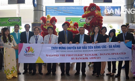 Representatives from the city’s tourism sector welcoming passengers from the first flight