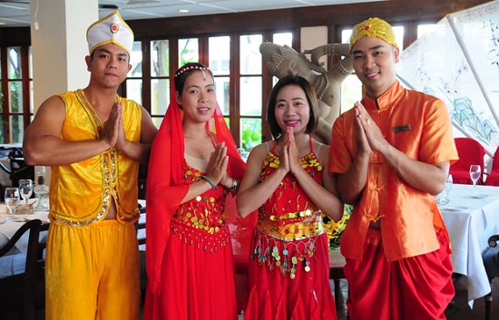 Some employees of the Furama Resort Danang wearing traditional Indian costumes 