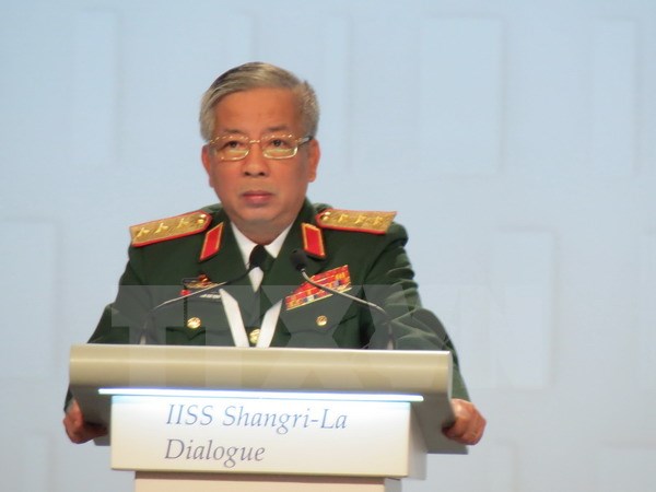 Thứ trưởng Bộ quốc phòng Nguyễn Chí Vịnh phát biểu tại phiên họp toàn thể thứ tư. (Ảnh: Việt Dũng/TTXVN)
