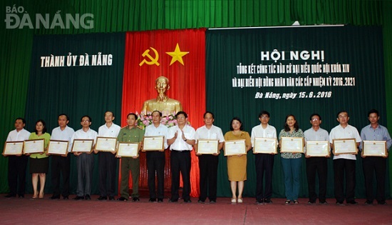 Deputy Secretary Tri and the honourees