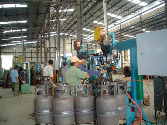 Employees at an LPG bottle filling establishment