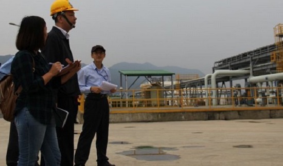 People are pictured near the wastewater treatment area at the Formosa steel plant in Ha Tinh, located in north-central Vietnam.