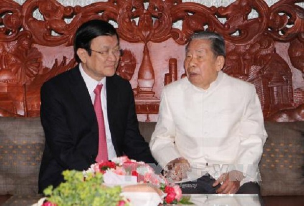  Late former Laotian NA Chairman Xaman Vinhaket (right) and former Vietnamese State President Truong Tan Sang  (Photo: baotintuc.vn)