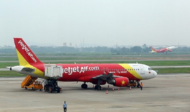 A Vietjet Air plane sits at Noi Bai International Airport in Hanoi. Vietjet