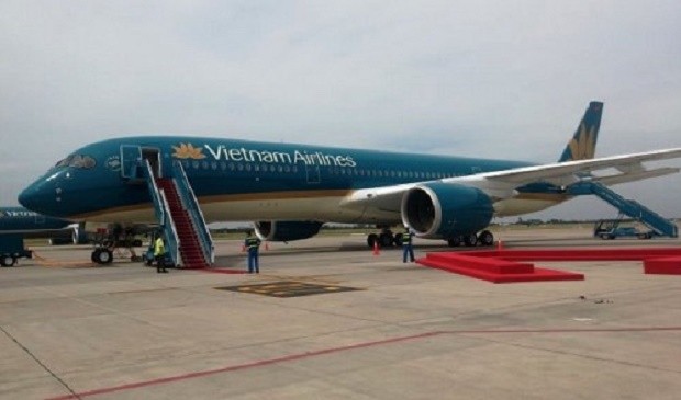 A Vietnam Airlines plane sits on the tarmac at Noi Bai International Airport in Hanoi.
