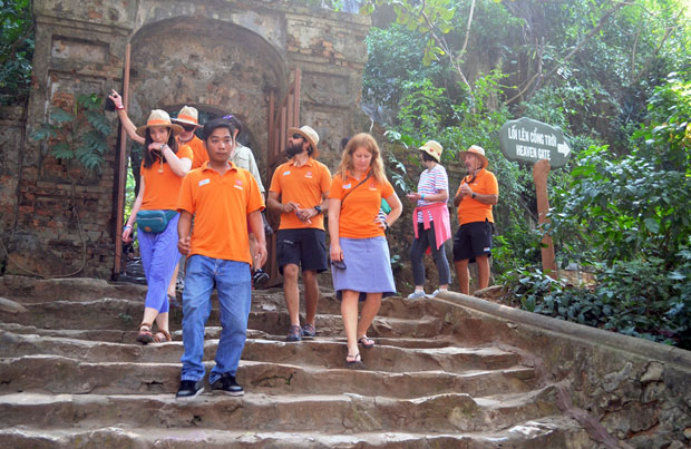 Some of the Da Nang-Viet Nam Clipper Race yacht's crew members visiting the Marble Mountains