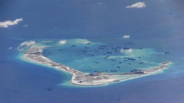 Chinese dredging vessels are purportedly seen in the waters around Mischief Reef in the Spratly (Truong Sa) Islands in the East Sea. (Photo: Reuters)