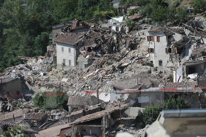 Những ngôi nhà bị tàn phá trong động đất tại Pescara del Tronto ngày 25/8. (Nguồn: AFP/TTXVN)