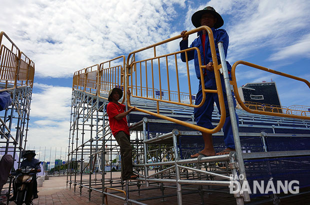 Workers installing viewing stands