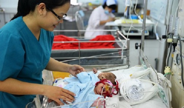 The conjoined twin girls are being treated at Children’s Hospital 2 in Ho Chi Minh City. Tuoi Tre