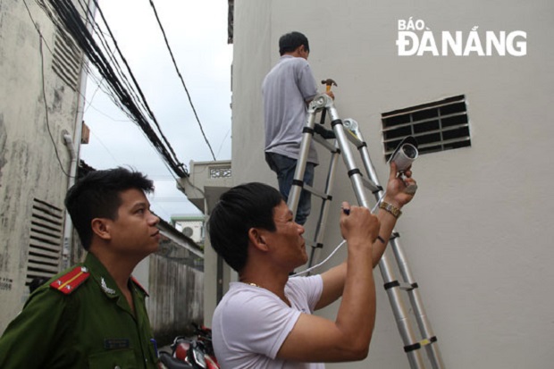 A security camera being installed in a local ward 