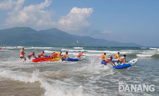 Kayak racing at a local beach