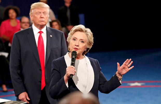 Tỷ lệ ủng hộ bà Hillary Clinton và ông Donald Trump đang  sít sao. 					Ảnh: Reuters