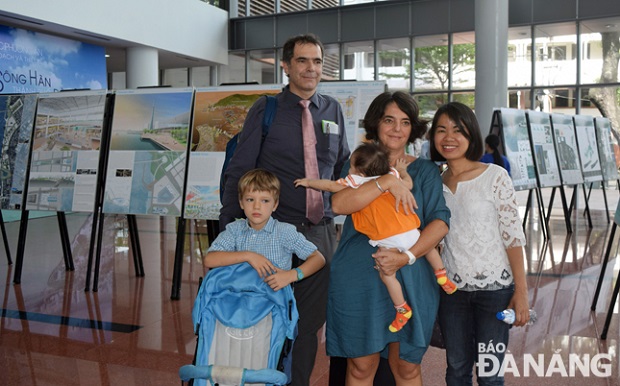 A family of foreign visitors at the exhibition