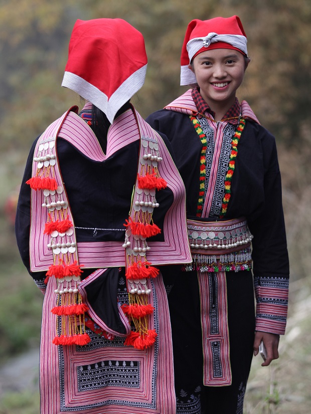    Two young ladies chatting together