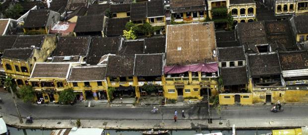 The street, canals, bridges and the distinctive yellow houses here have been unchanged for hundreds of years.