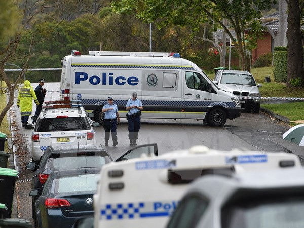 Cảnh sát Úc tại một cuộc điều tra ở New South Wales ngày 17-10. Nguồn: EPA/TTXVN