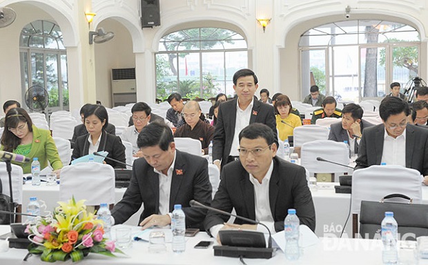    A participant presenting his opinions at the event