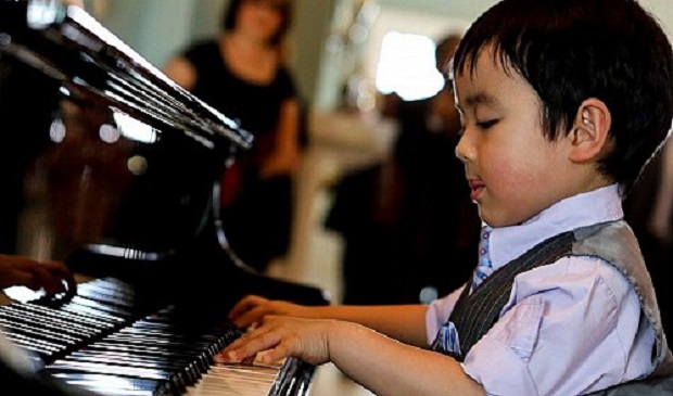 Evan Le recites a piano piece. SOUL Academy