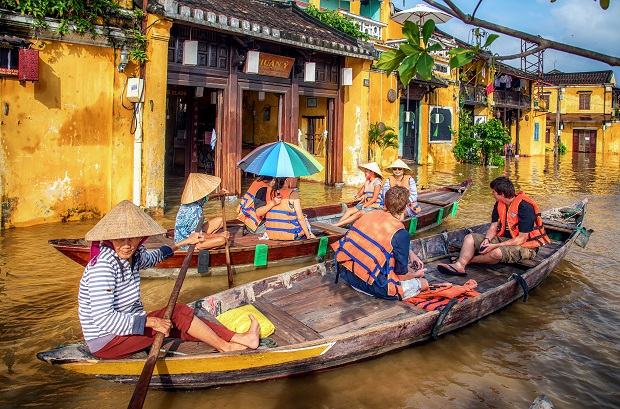  Visitors tour the ancient city by boat