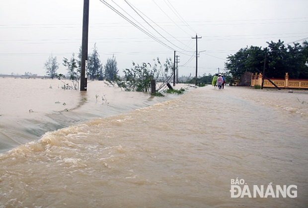 A section of the DH409 road under water