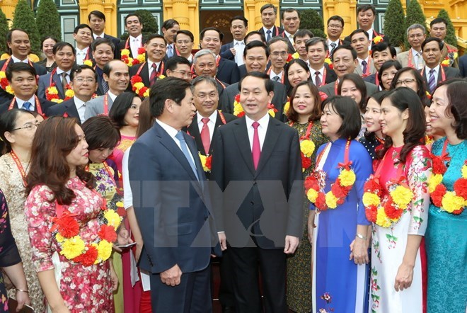 President Tran Dai Quang and delegates at the meeting (Photo: VNA)