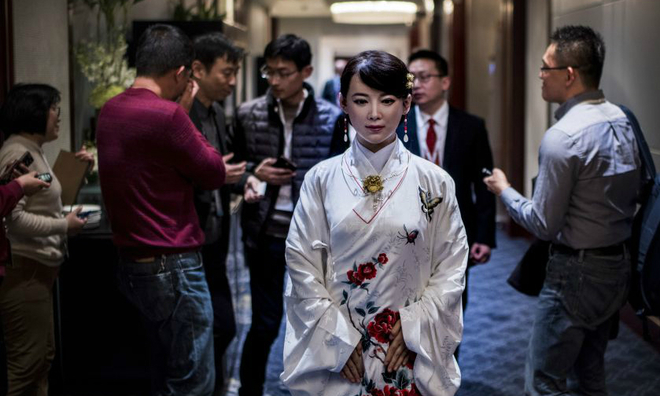 Humanoid robot Jia Jia, created by a team of engineers from the University of Science and Technology of China, is seen following a presentation at a conference in Shanghai on January 9, 2017. Her creators believe the eerily life-like robot heralds a future of cyborg labour in China. Photo by AFP