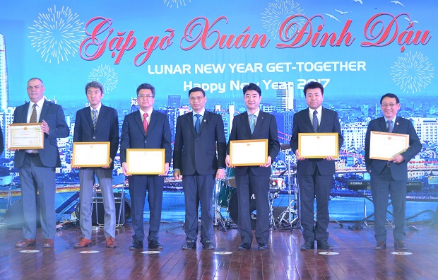 Vice Chairman Minh (centre) with some of the honourees