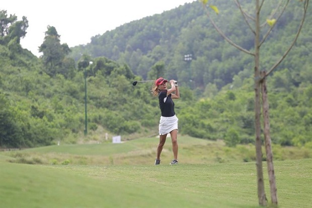 Swing: A golfer plays at Bà Nà Hills Golf Club in Đà Nẵng. — Photo courtesy of Bà Nà Hills Golf Club 