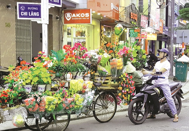  A local man buying artificial flowers