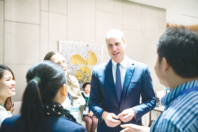 Prince William hearing about conserving the red-shanked douc langurs 