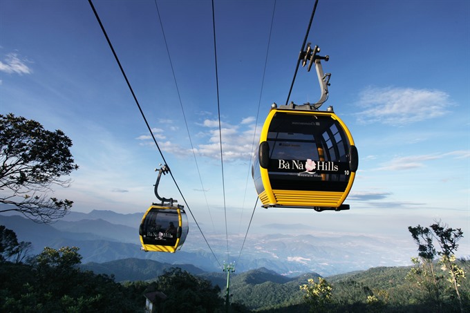 Guinness record: A cable car system carries tourists to the top of Bà Nà Mountain on the 1,471m above sea level. VNS Photo Read more at http://vietnamnews.vn/life-style/350263/da-nang-hills-alive-with-tet-carnival.html#tIdOrFqDFqSDF86Y.99