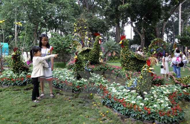 Children at the 2017 spring flower festival in Ho Chi Minh City (Photo: VNA)