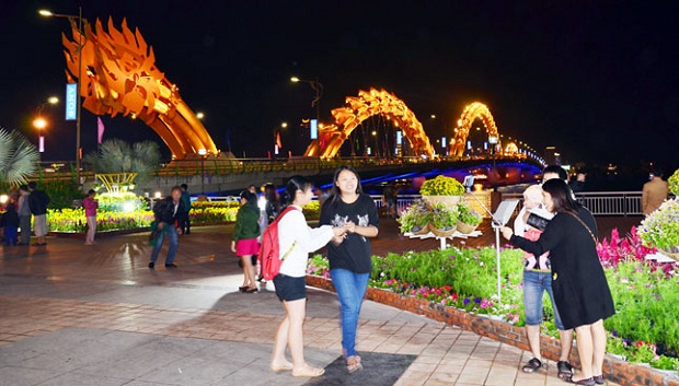  Local young people taking a late night stroll along the Bach Dang Riverside