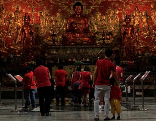 People pray at Seng Guan Temple during the Lunar New Year celebrations in Chinatown in Manila, Philippines. (Reuters)