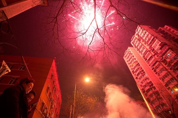 Residents set off fireworks on the eve of Lunar New Year in Beijing, China. (AP)