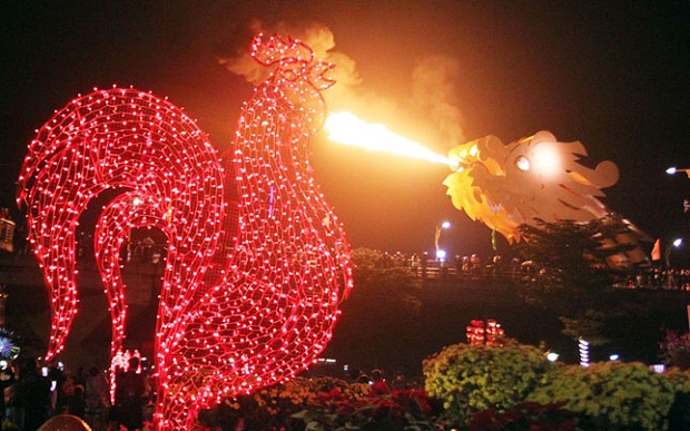 Images of a rooster and a dragon breathing fire 