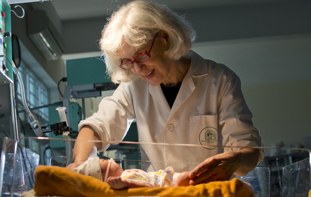 Suzanna Lubran, a freelance worker at the neonatal department, takes care of a premature baby.