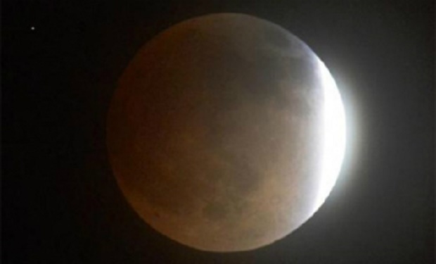 A lunar eclipse in 2014. Photo by Reuters.