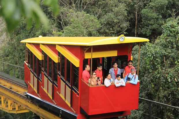 Visitors exploring the beauty of Ba Na Hills’ nature from a mountain-climbing train