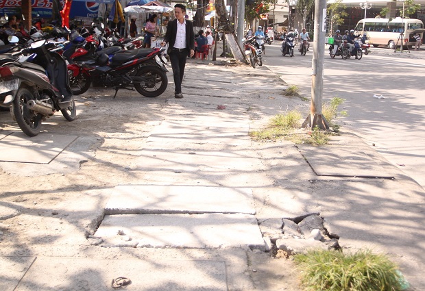  A deteriorated pavement section along Hoang Dieu