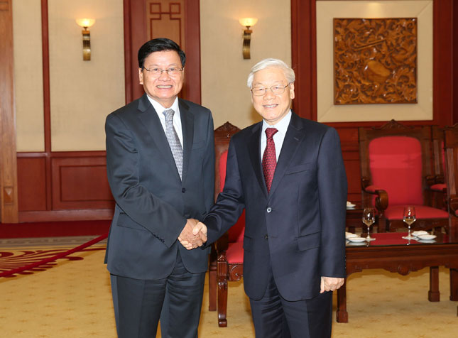 Tổng Bí thư Nguyễn Phú Trọng tiếp Thủ tướng Lào Thongloun Sisoulith.  Ảnh: TTXVN