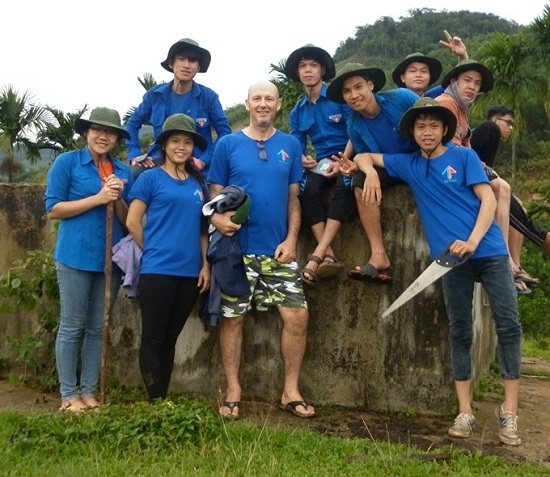 Green fingers: Bruno Cerignat (centre) takes part in volunteer programme Mùa Hè Xanh (Green Summer) with students in Quảng Ngãi. — Photo courtesy of Bruno Cerignat